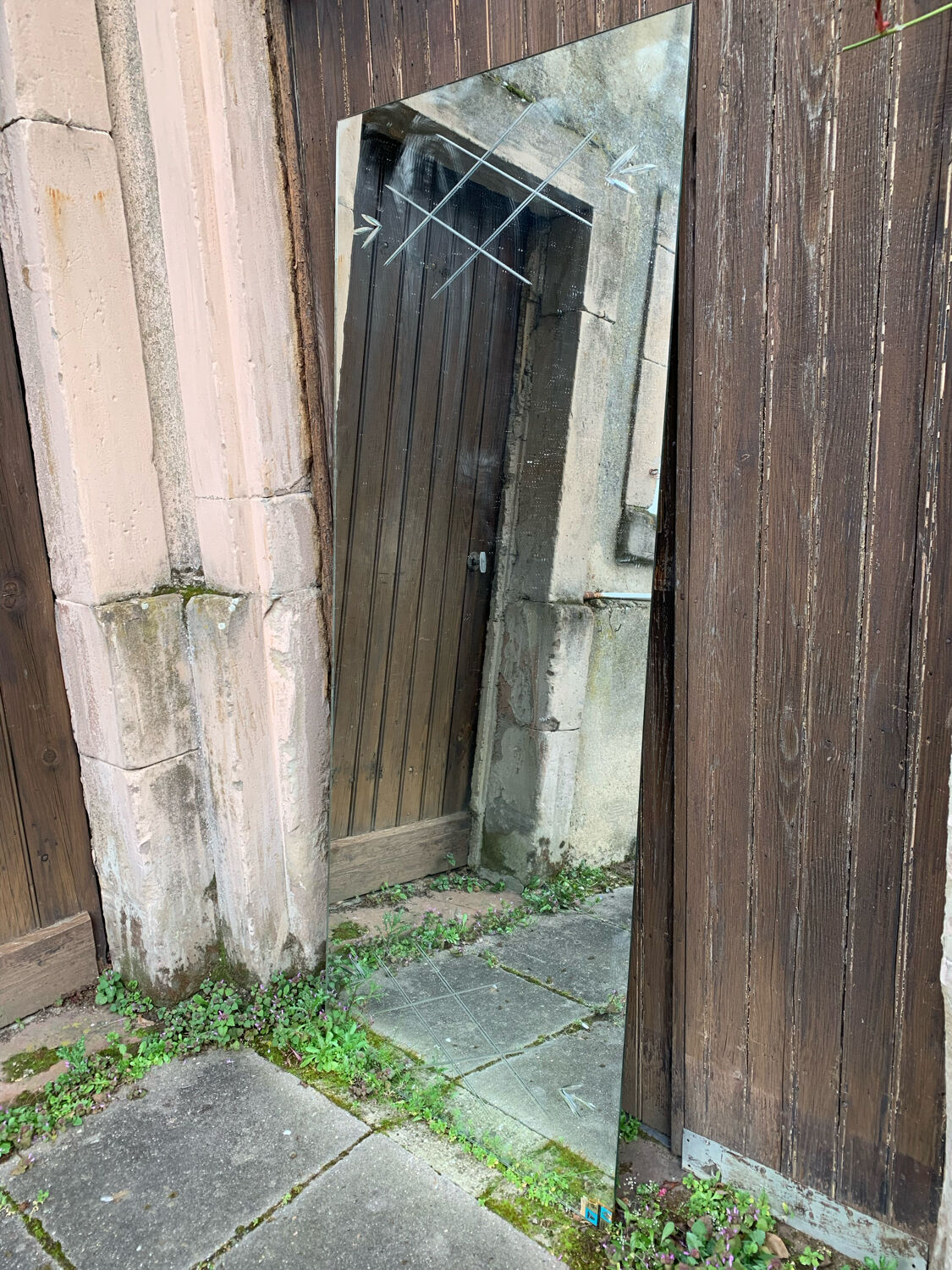 Marly brothers chiseled mirror in burgundy made in France 1950-1960