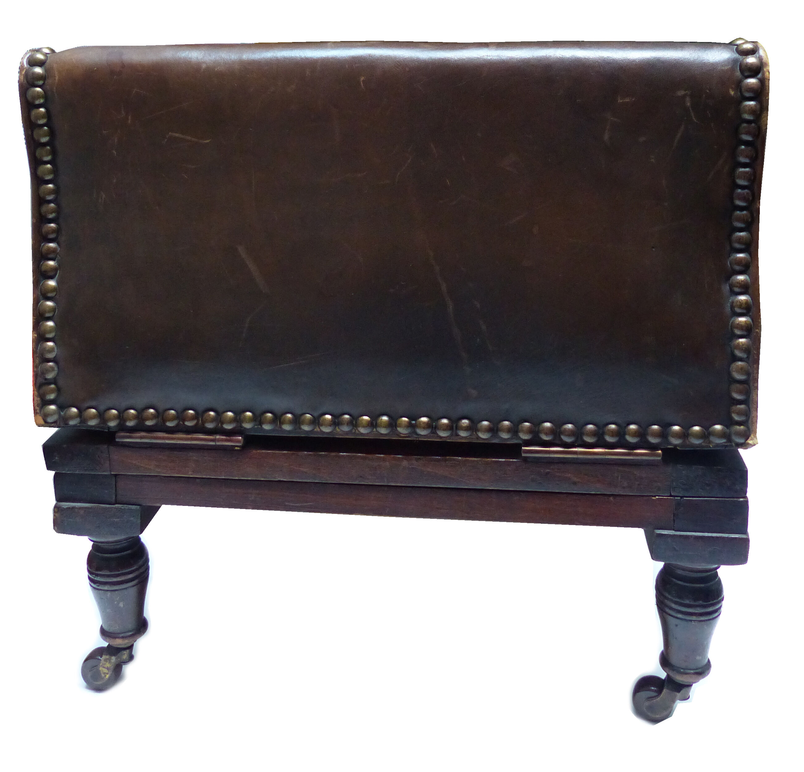 Old adjustable chair in wood and leather