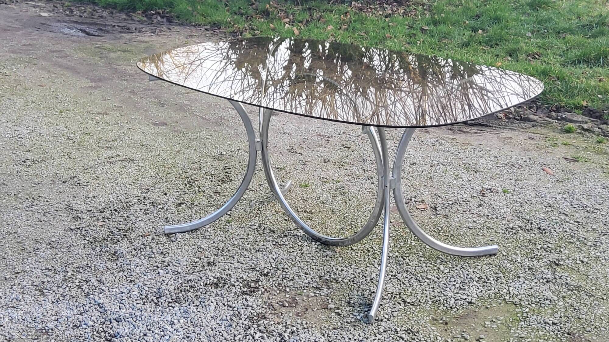 Designer table from the 70s, smoked glass top, chrome base