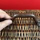 Rare antique wicker picnic basket with iron closures and handle