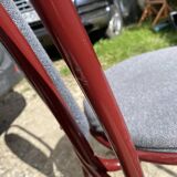 Metallic burgundy bistro chair for restaurants and communities with gray fabric
