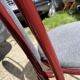 Metallic burgundy bistro chair for restaurants and communities with gray fabric