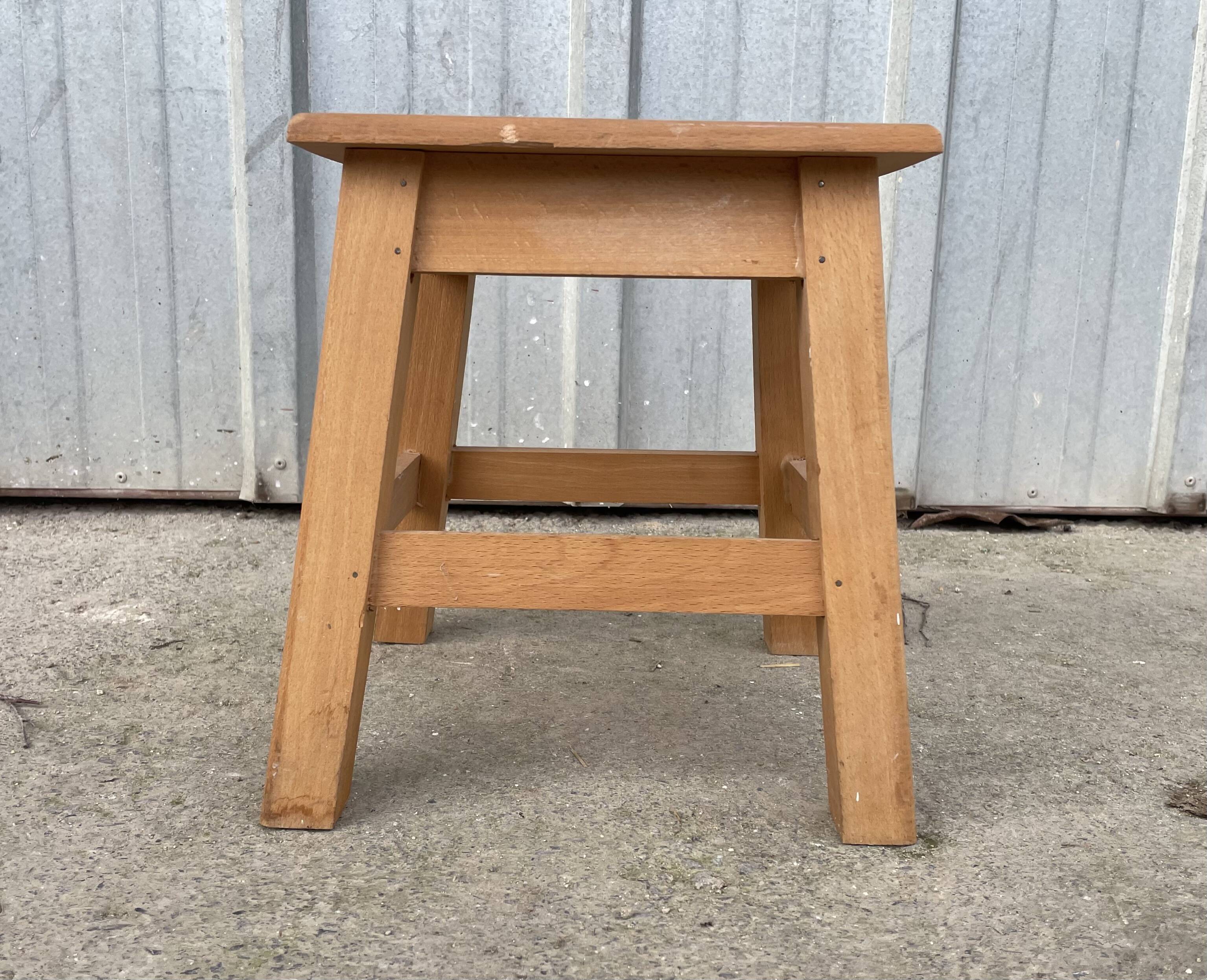 Small low wooden stool