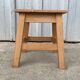 Petit tabouret bas en bois