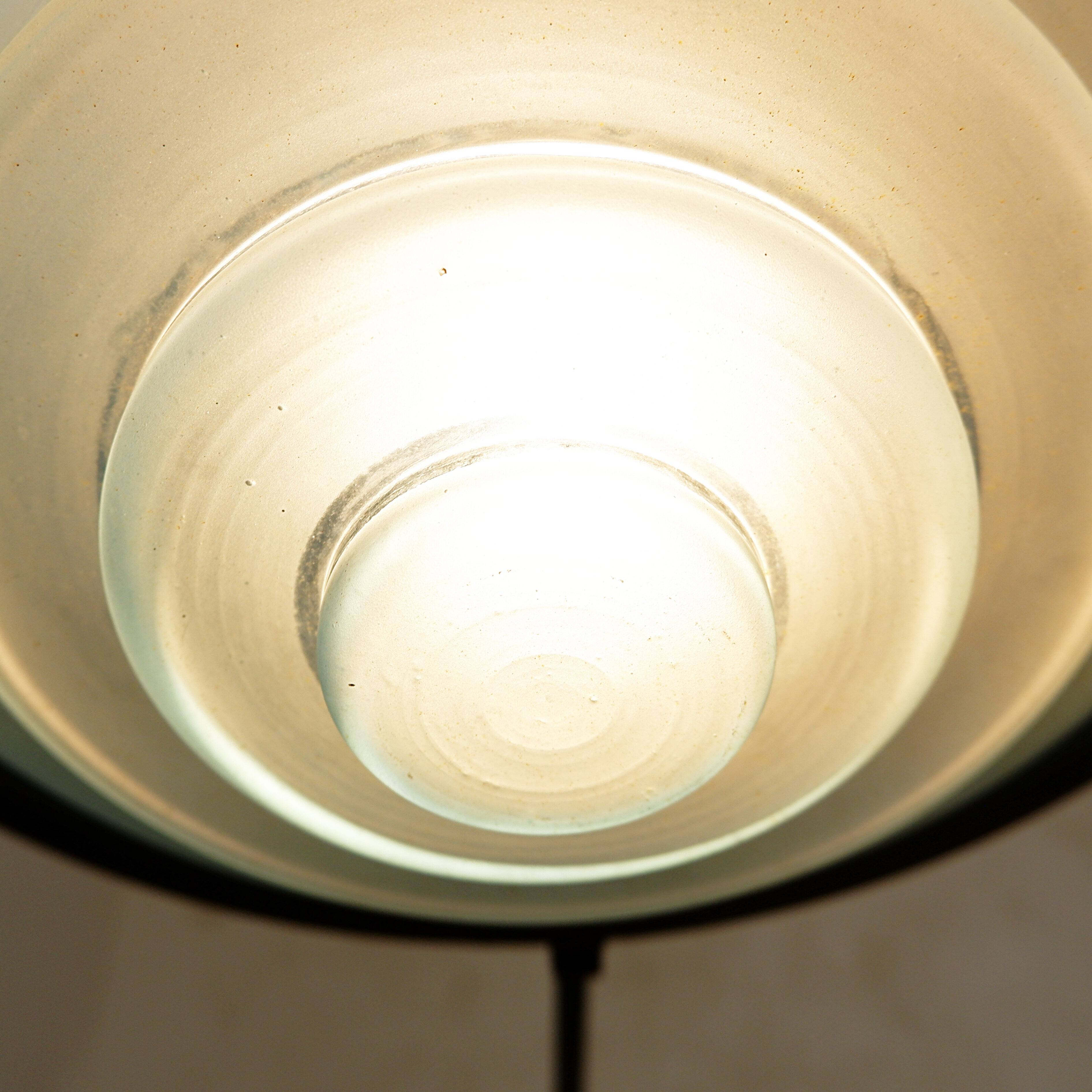 Floor lamp in metal and sandblasted glass disc