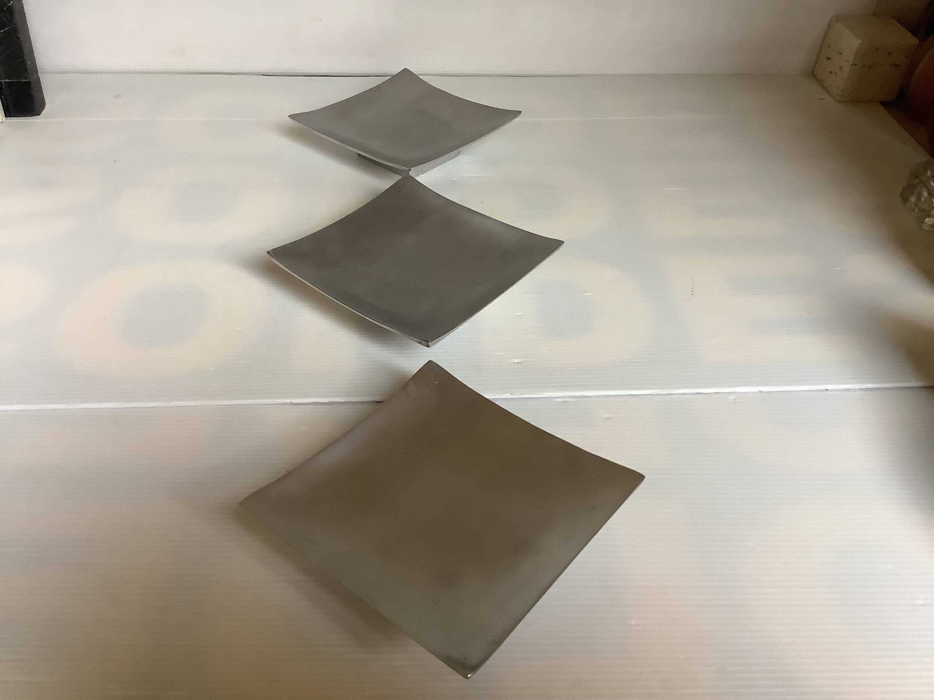 Three silver-plated metal trinket trays/candle holders