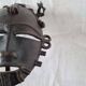 African bronze mask on pedestal, from Ivory Coast, dating