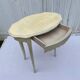 Eggshell-coloured drawer with a cracked effect side table.