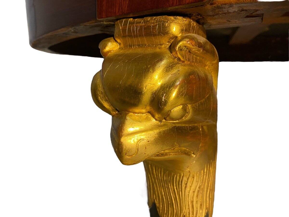 Grand guéridon aux corbins d’époque Empire