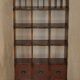 Pair of open bookshelves in crocodile leather with drawers and compartments.