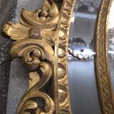 Miroir ovale en bois doré