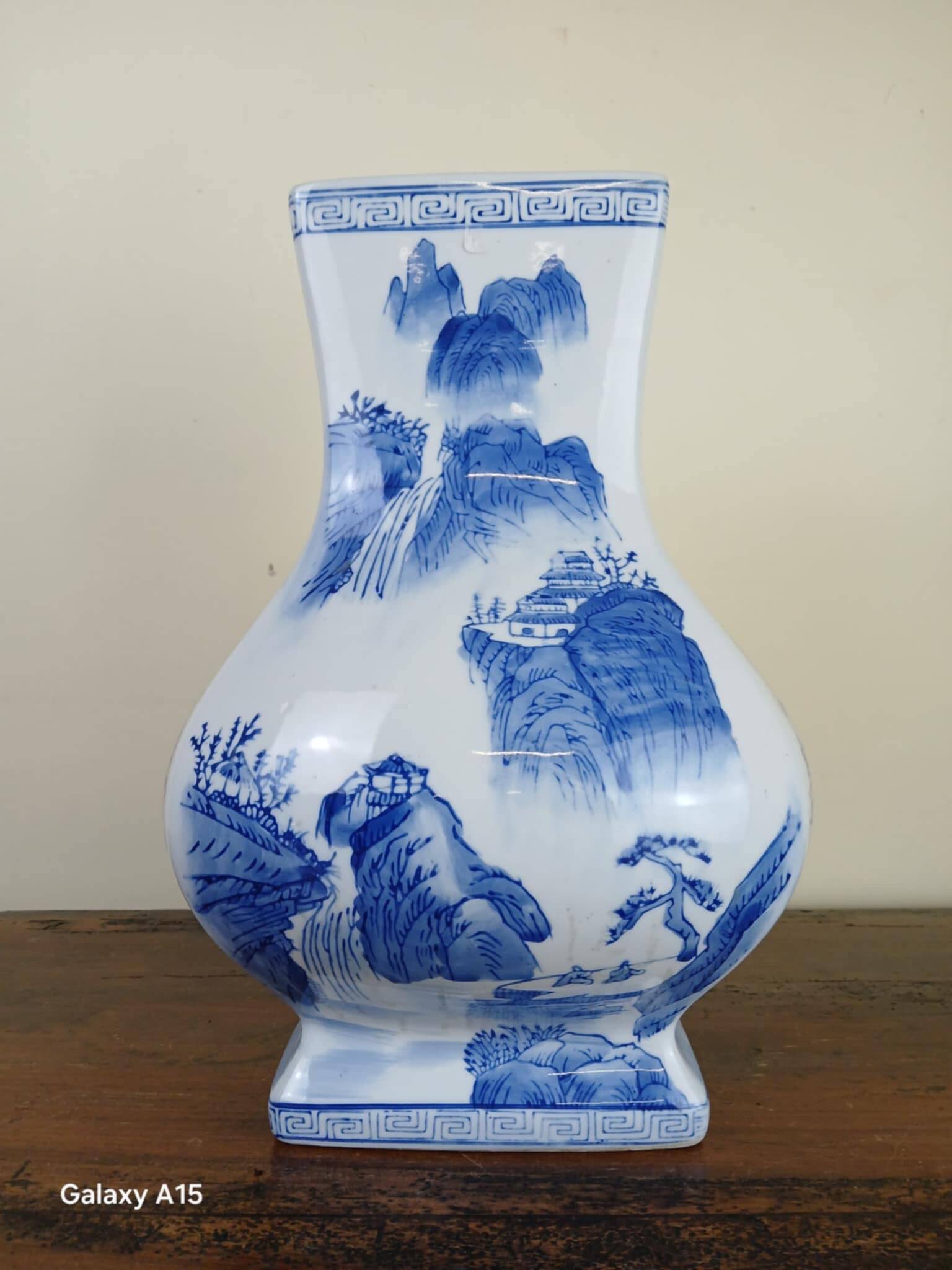 China circa 1920: porcelain vase with blue and white decoration