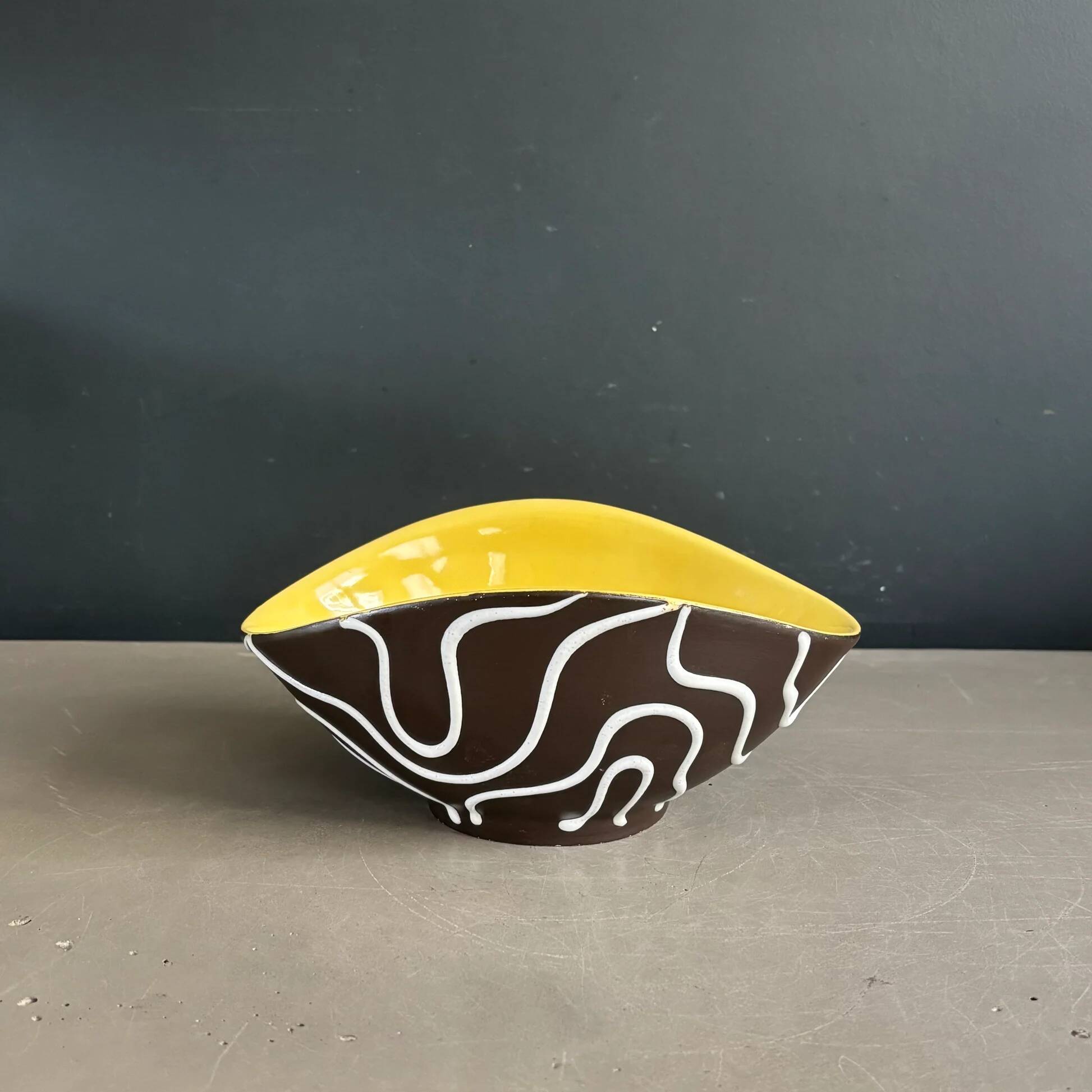 Yellow and black ceramic aperitif bowl, free form, West Germany.