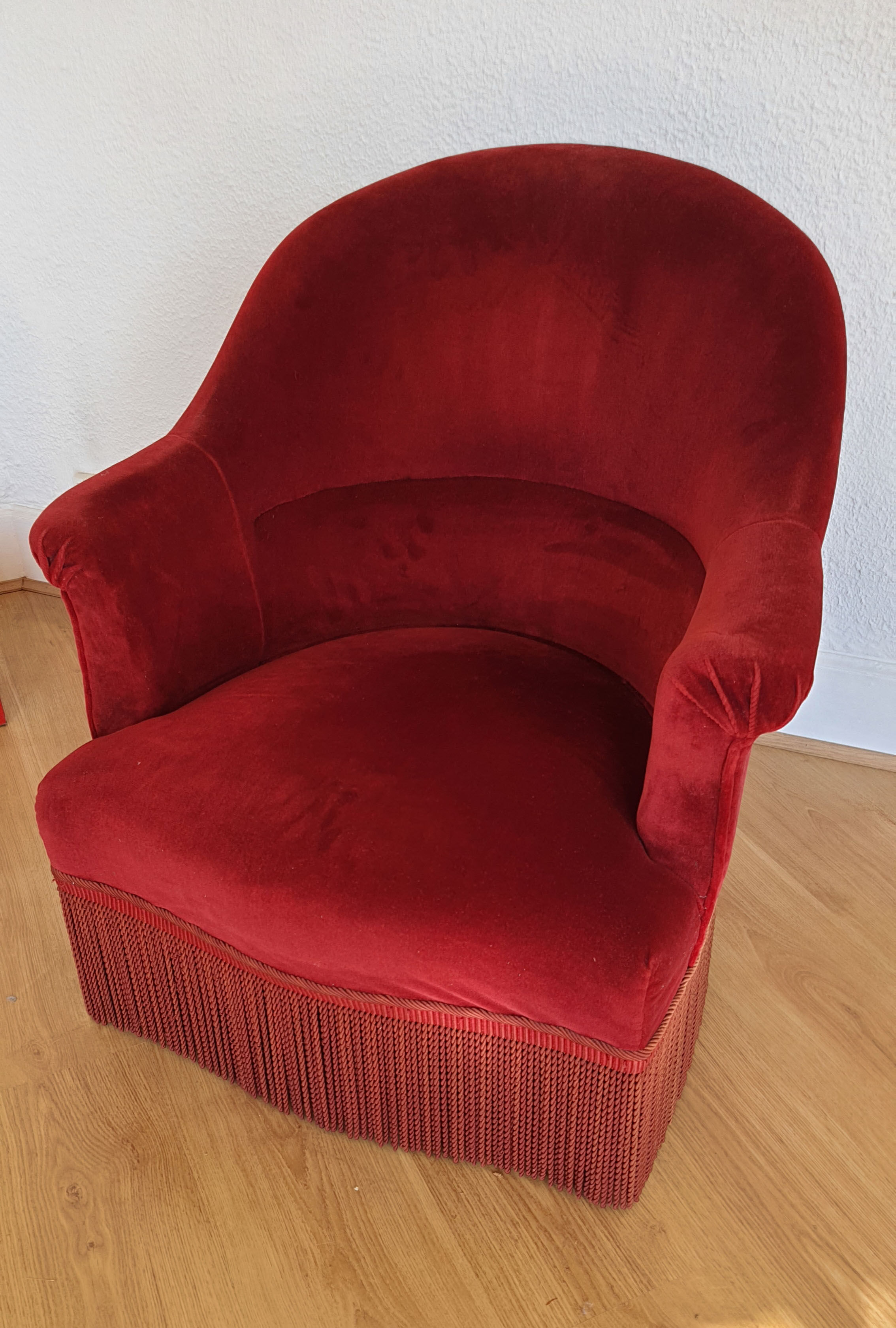 Fauteuil crapaud en velours rouge