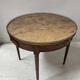 Louis XVI style bouillotte table in veneered wood, 20th century.