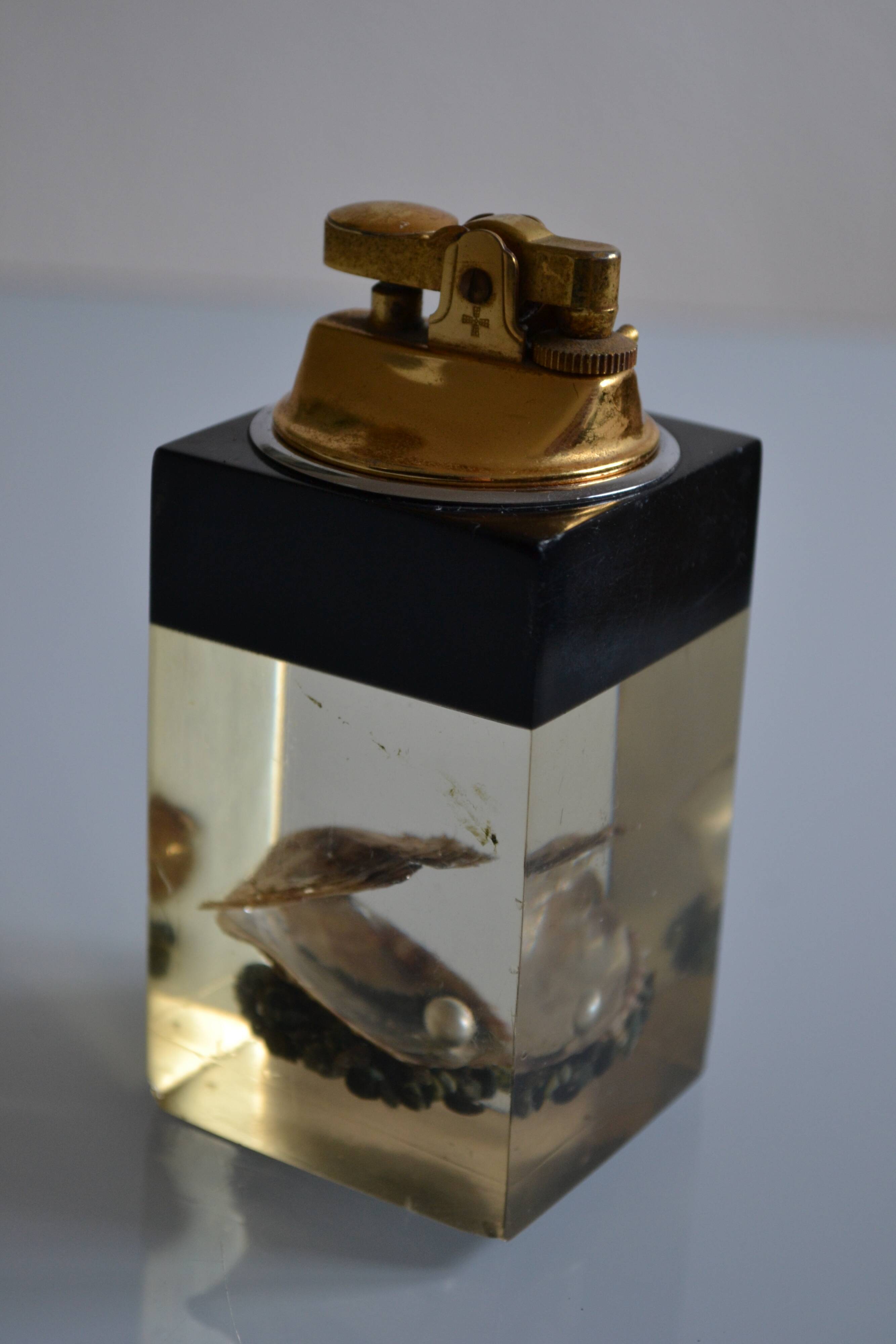 1970 Table lighter with pearl oyster in resin inclusion