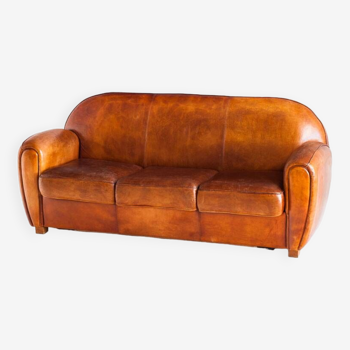 Vintage leather club sofa. Art Deco style. France, 1950s. (sofa convertible into bed)