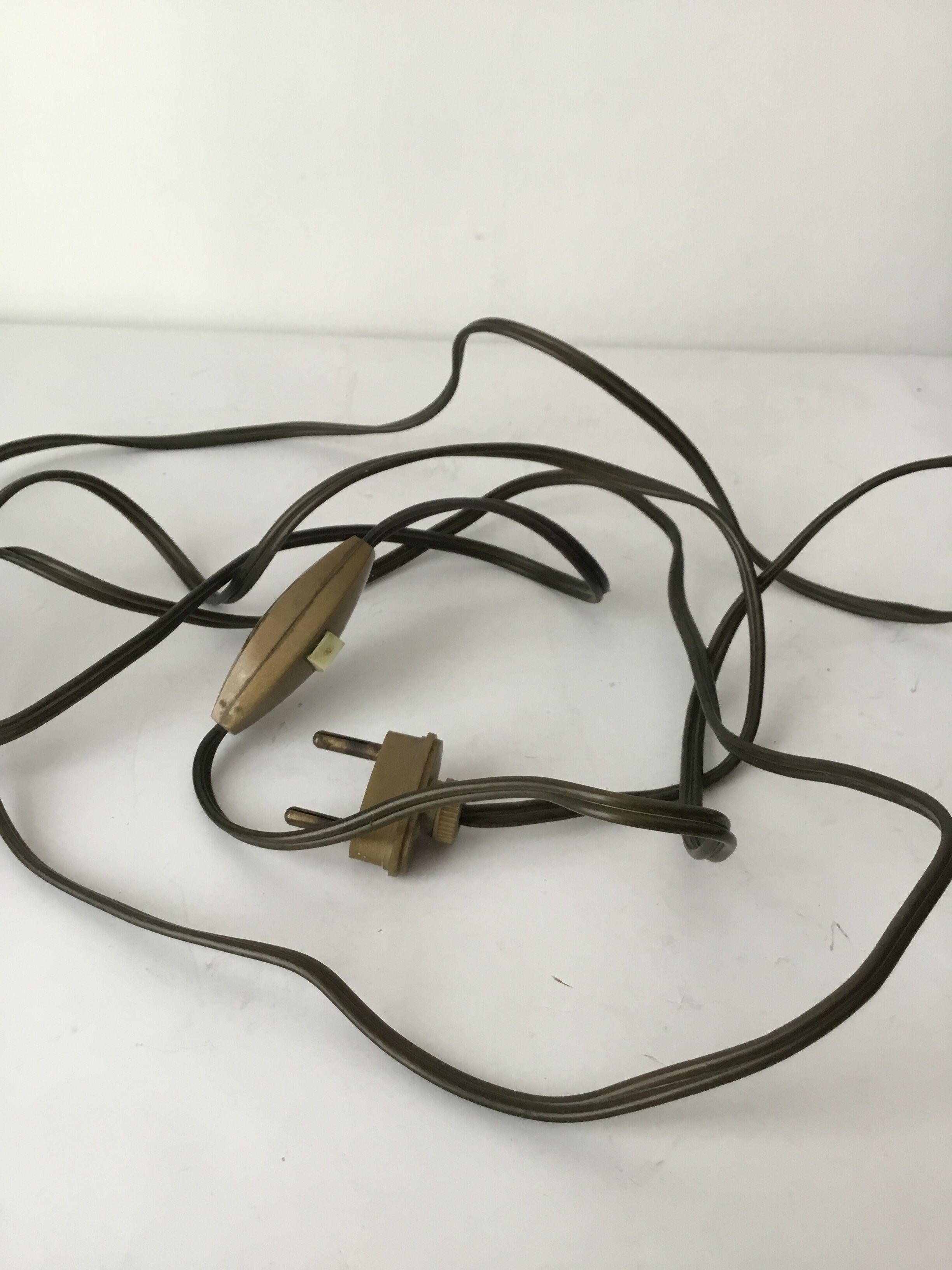 Brass candle-shaped lamp