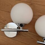 Pair of metal and opaline wall lights