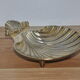 Empty-pocket scallop shell