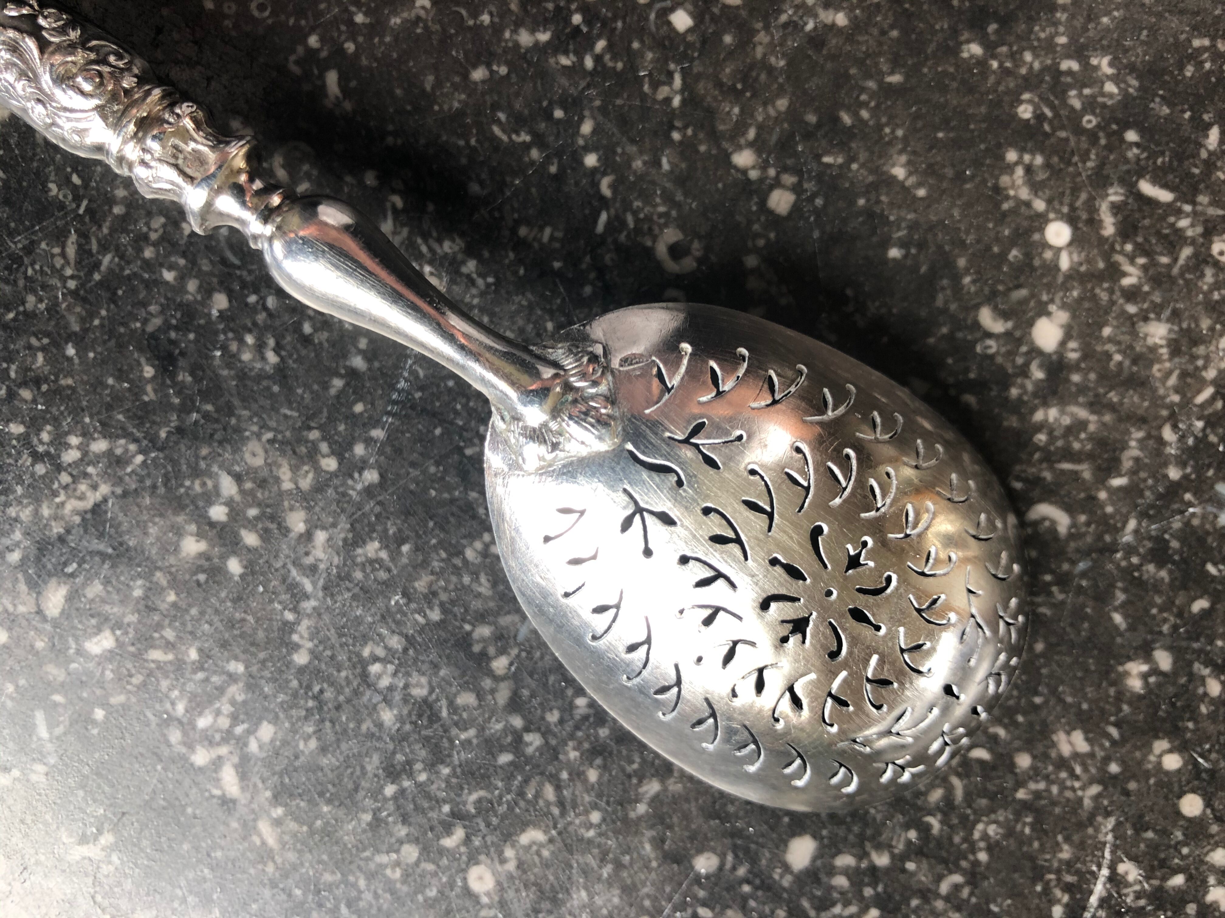 Silver sugar spoon