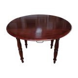 Old-pane-top round table in mahogany