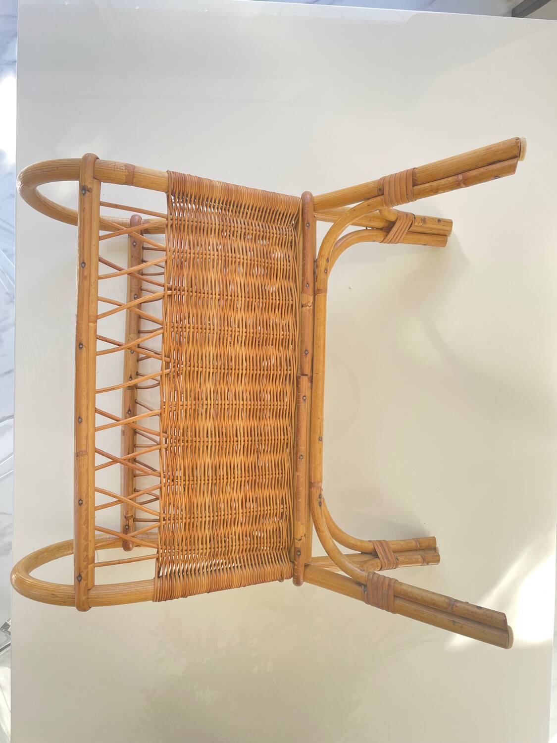 Old rattan magazine rack from the 70s