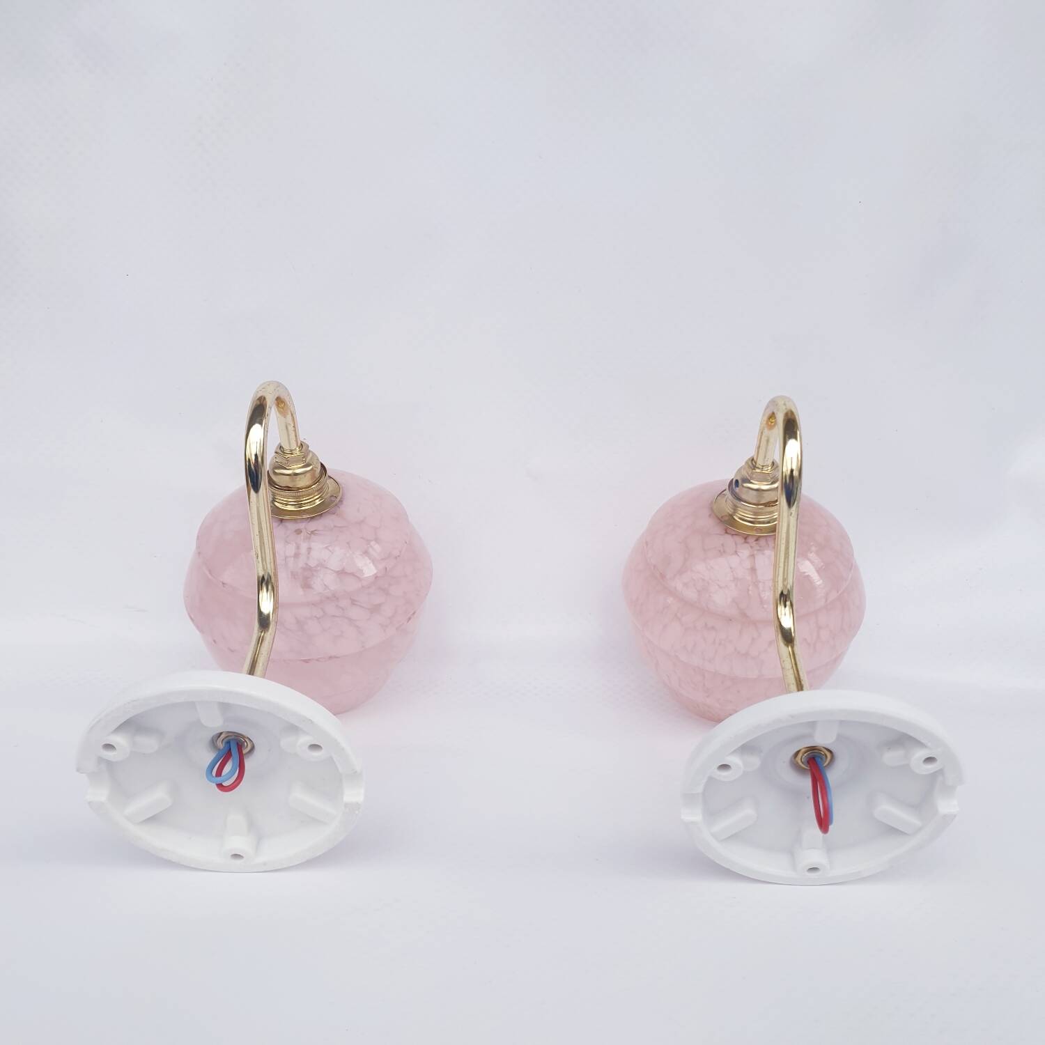 pair of vintage speckled pink and brass wall lights