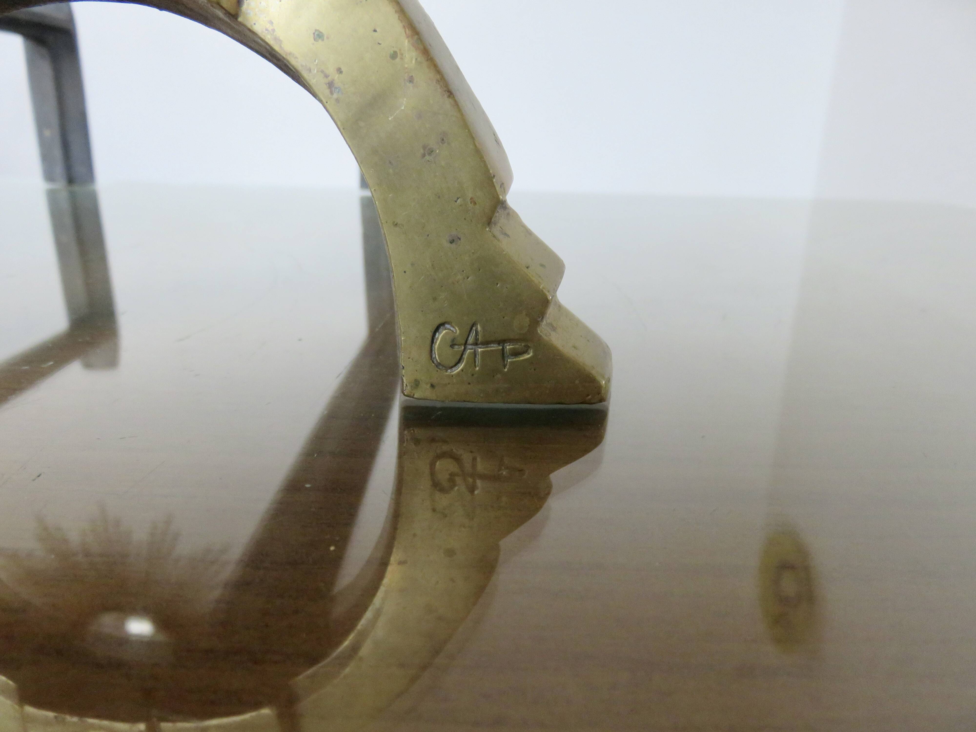 Anton Prinner, pair of Shaman fire dogs in gilded bronze, monogrammed, 1930