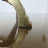 Anton Prinner, pair of Shaman fire dogs in gilded bronze, monogrammed, 1930