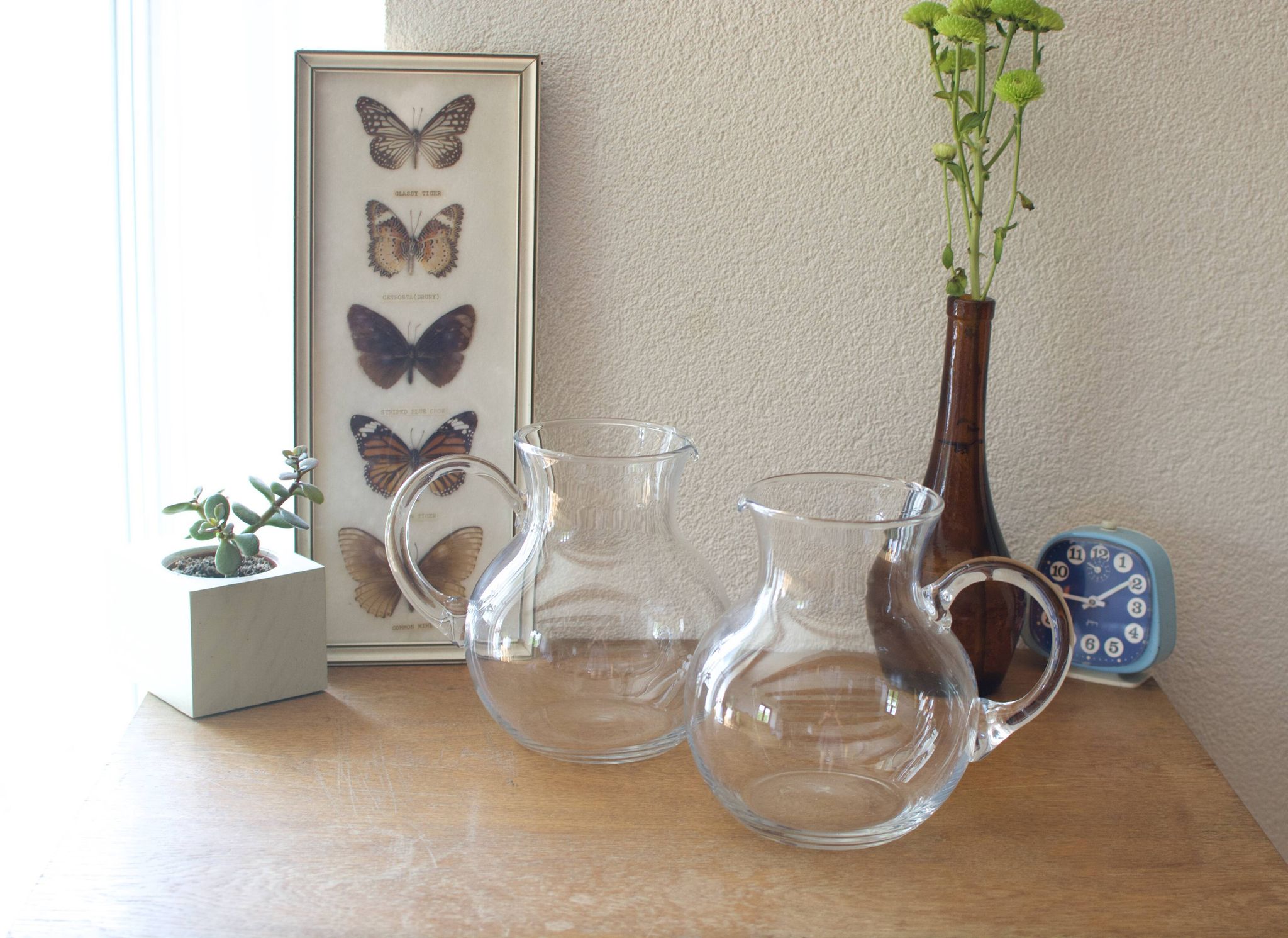 Pair of Orangeade pitcher in blown glass