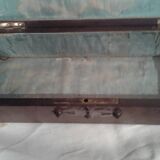 Old studded wooden box adorned with flat iron