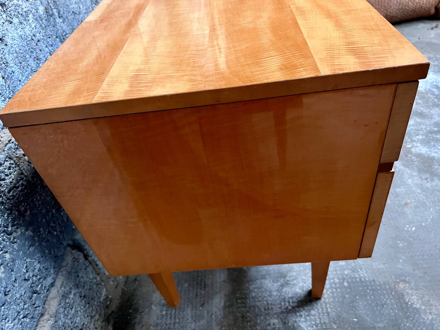 Light wood row TV unit