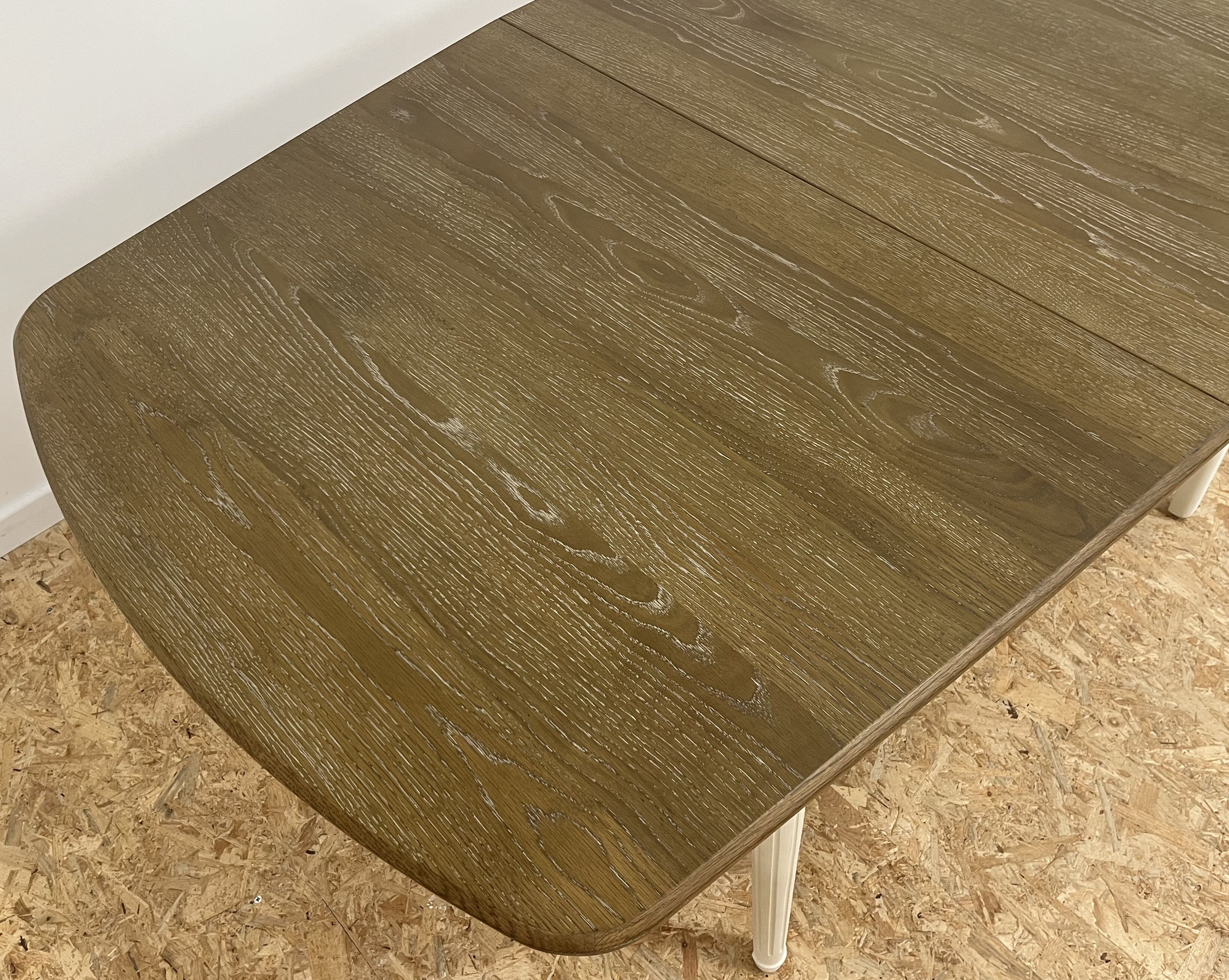 Extendable wooden dining table, white legs, 16/18 covers
