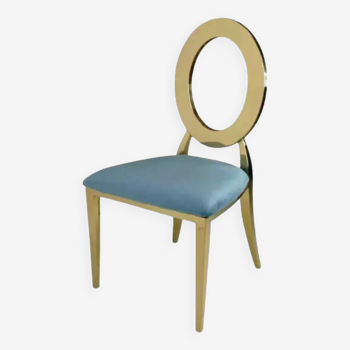 Gold chair and turquoise velvet seat
