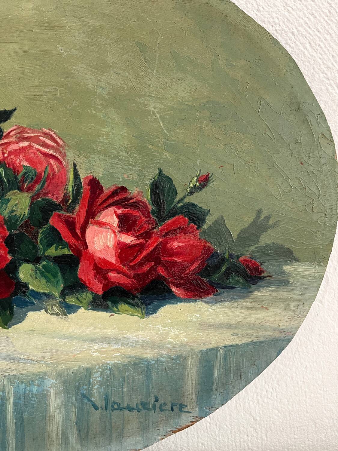 Old oil painting on oval wood with roses thrown from the 30s