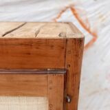 Low cabinet in raw wood and woven raffia