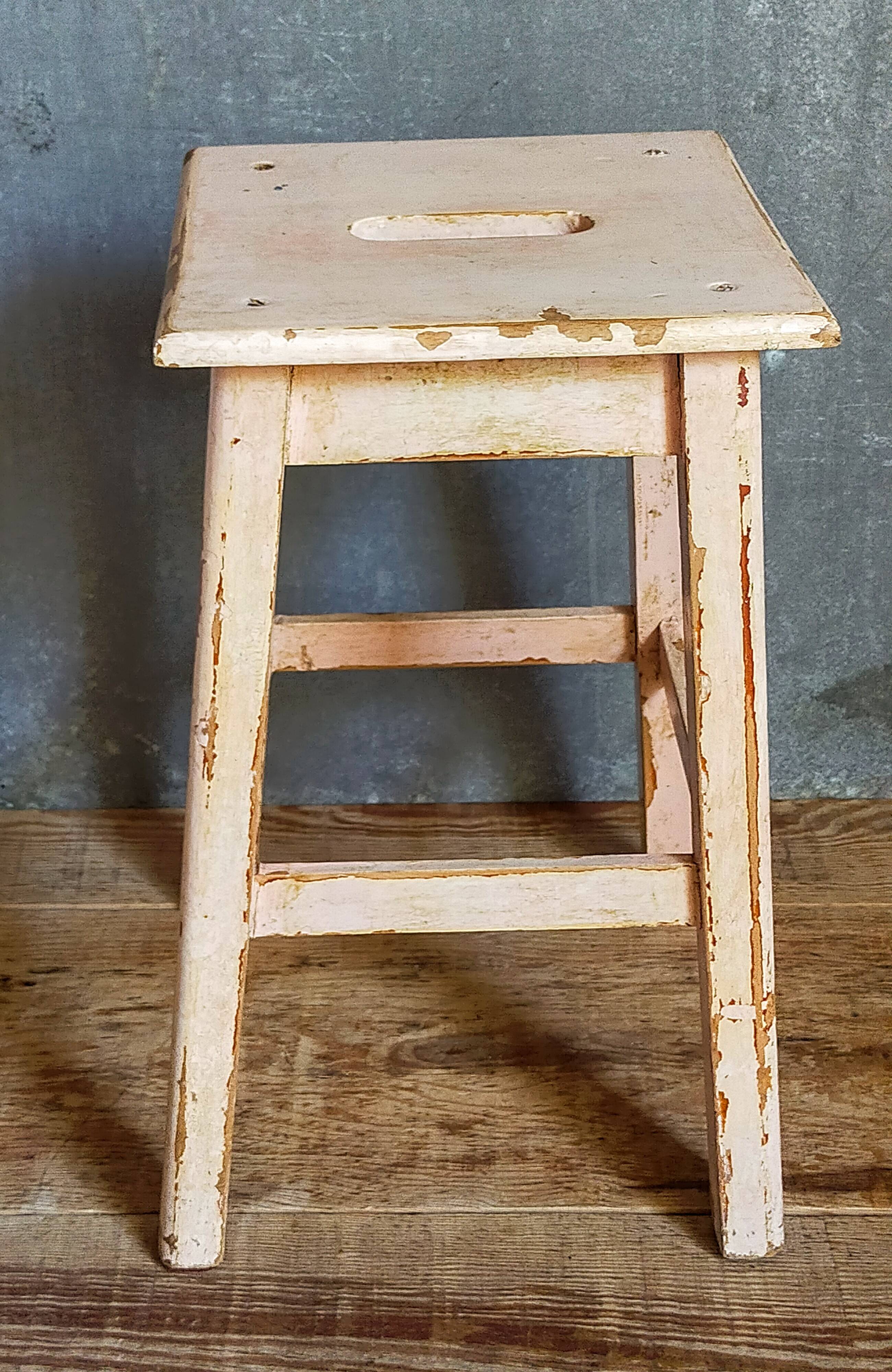 Antique workshop stool in patinated solid wood