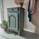 Small vintage side table in sage green patina and solid wood.