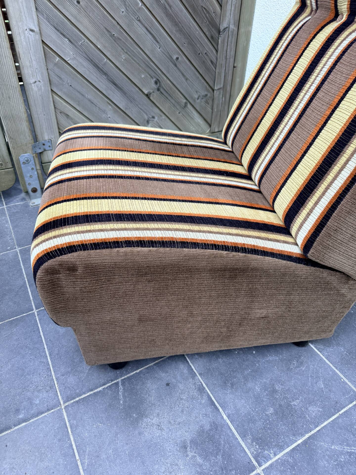 Vintage 1970s lounge chair – striped orange, brown, and cream velvet