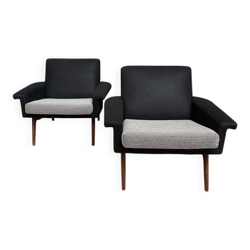 set of two black and white arm chairs 1960s
