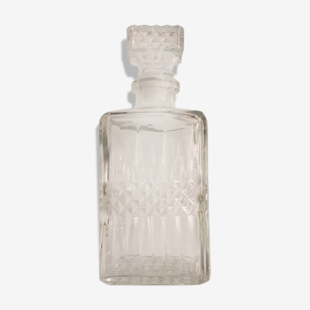 Carafe or bottle has chiseled worked glass whiskey