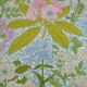 Nappe ronde à décor de fleurs vers 1970