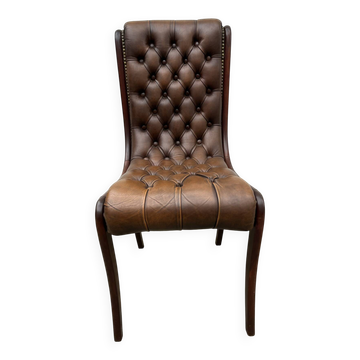 Brown leather tufted Chesterfield chair