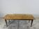 Old farmhouse table with tapered legs, late 19th to early 20th century.
