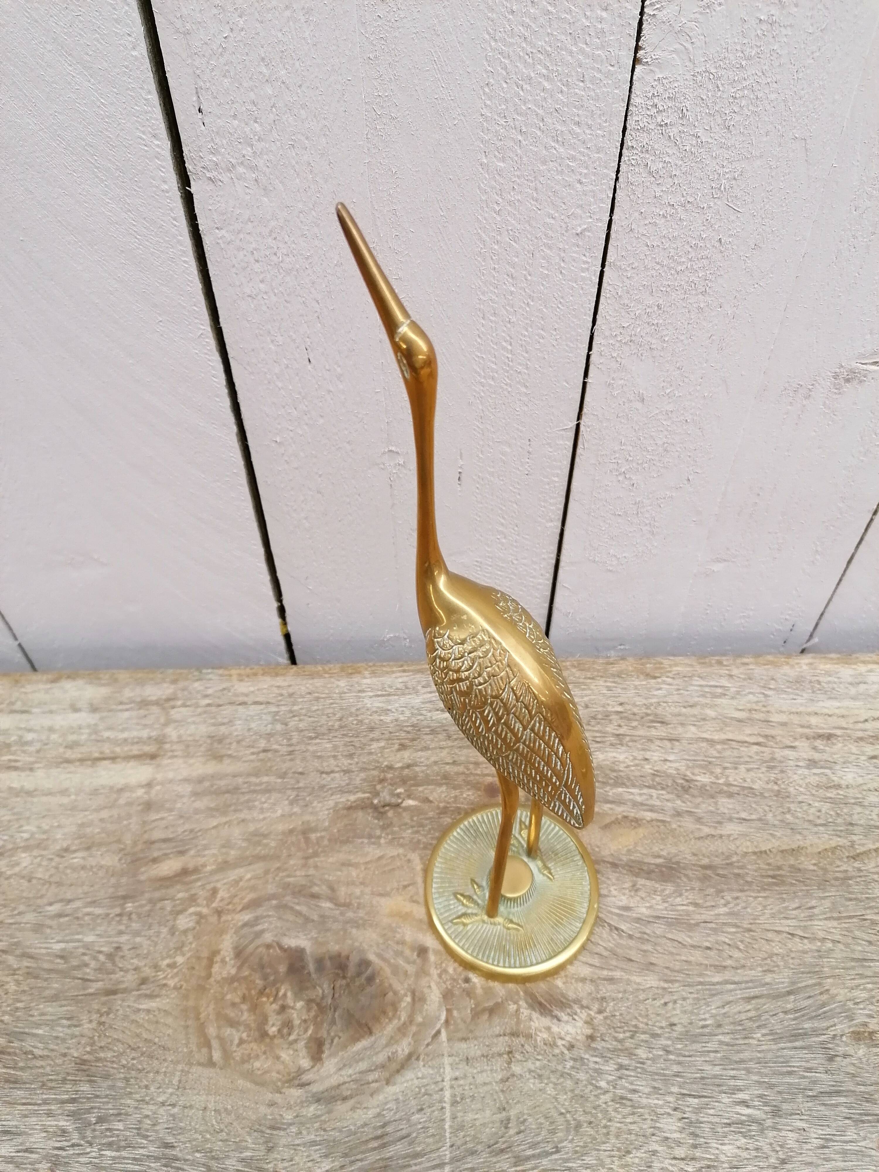 Pair of brass herons