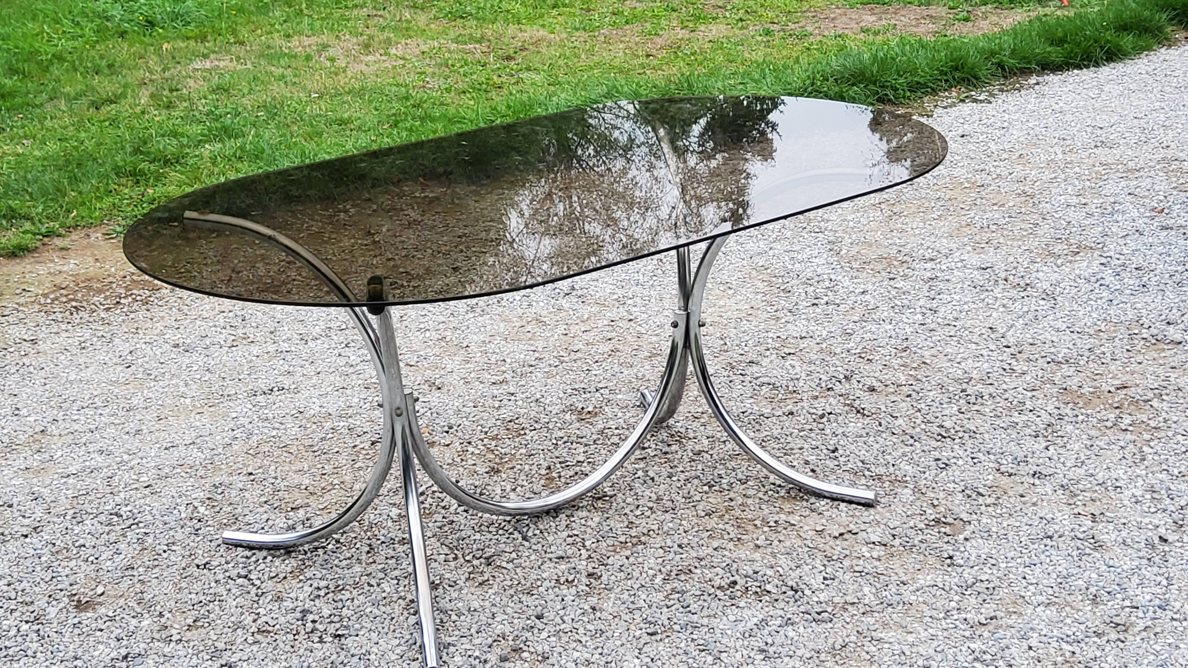 Dining table from the 70s top smoked glass base chrome