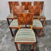 Set of six Art Deco dining chairs in walnut root veneer, 1940s.