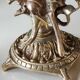 Paire de chandeliers antiques à 3 feux de lumières puttis/angelots bronze