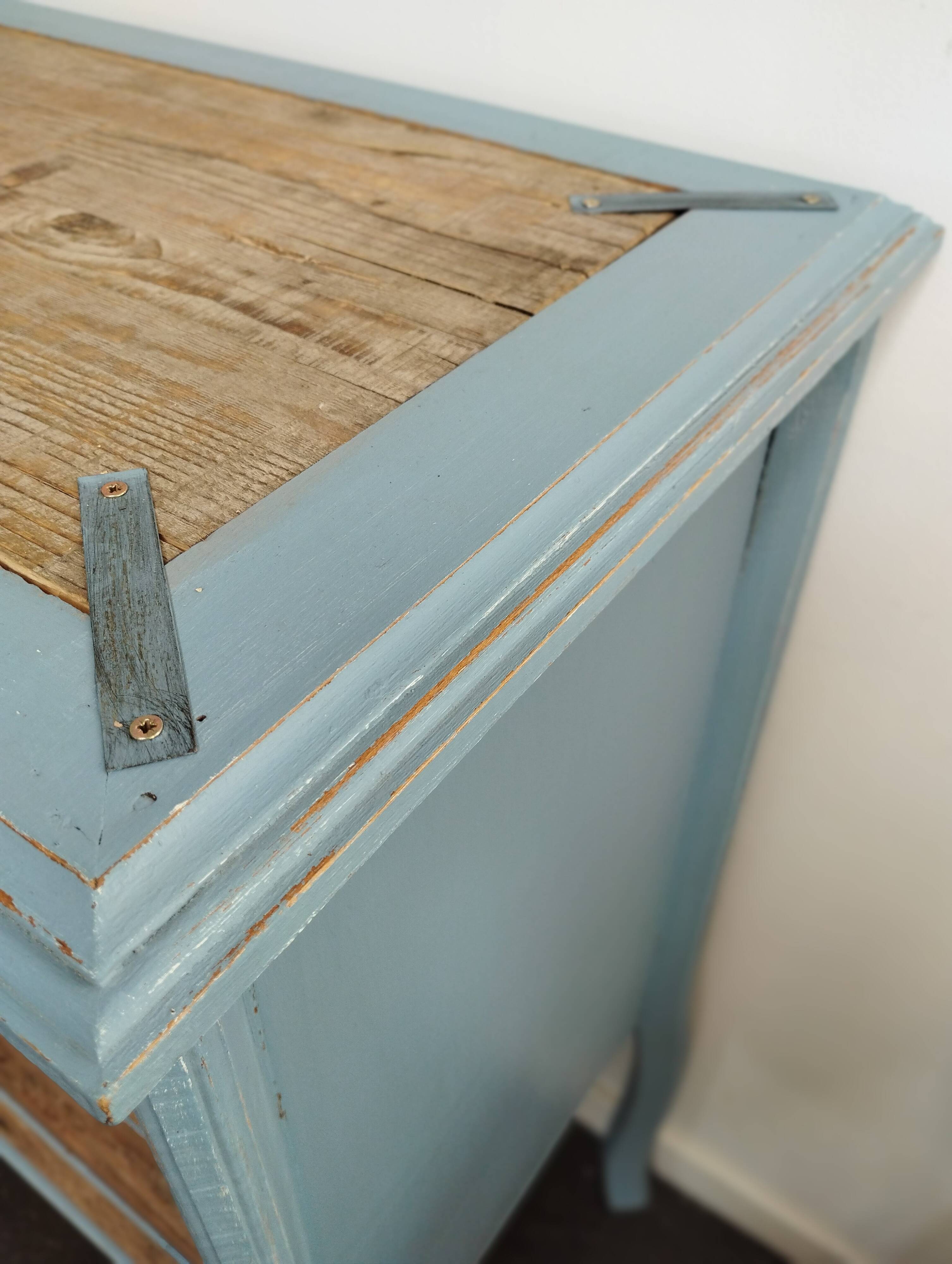 Small carved wood chest of drawers